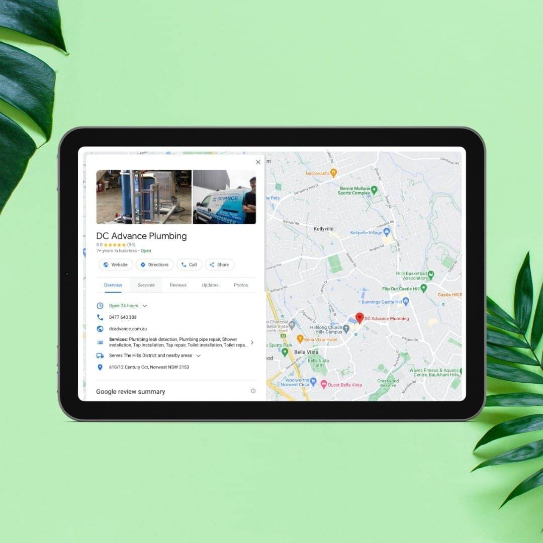 A tablet showcasing a business profile for DC Advance Plumbing on a map with nearby locations, highlighting their local