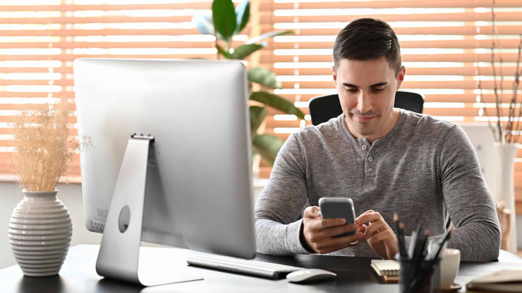 WordPress developer working at a desk on a client website build
